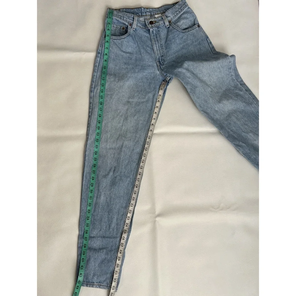 Vintage 90s Levis 560 Loose Fit Tapered Leg Jeans 29x34 Made in USA Light Wash